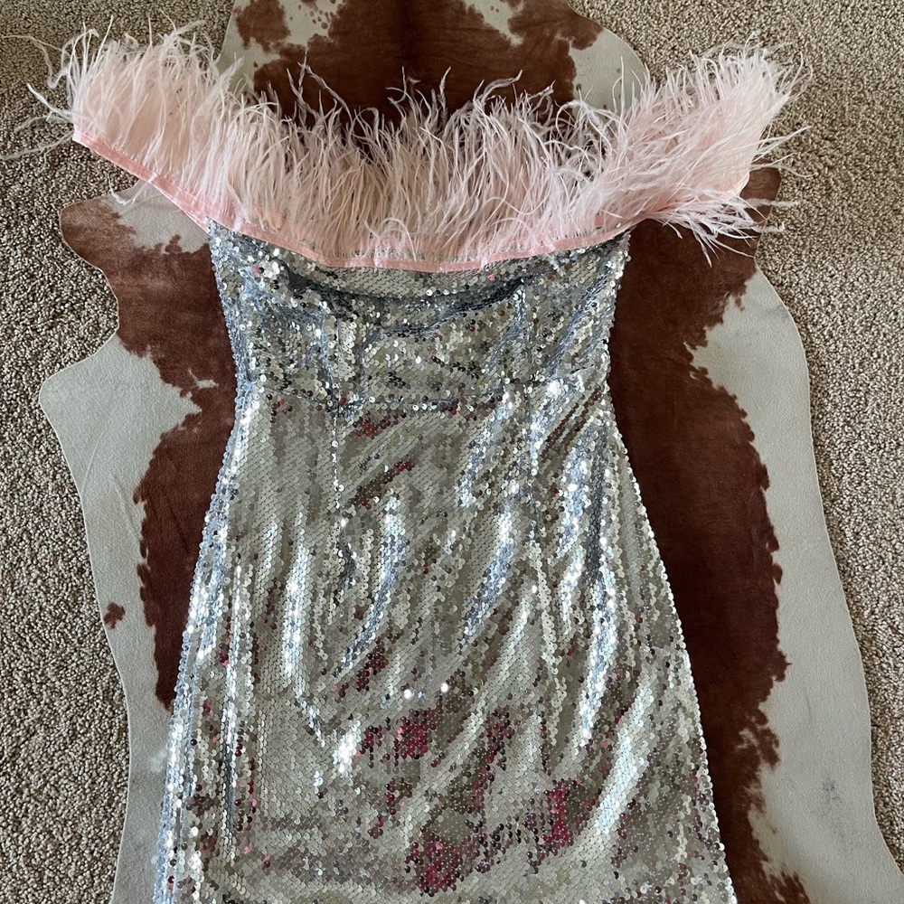 Sequin dress with feathers